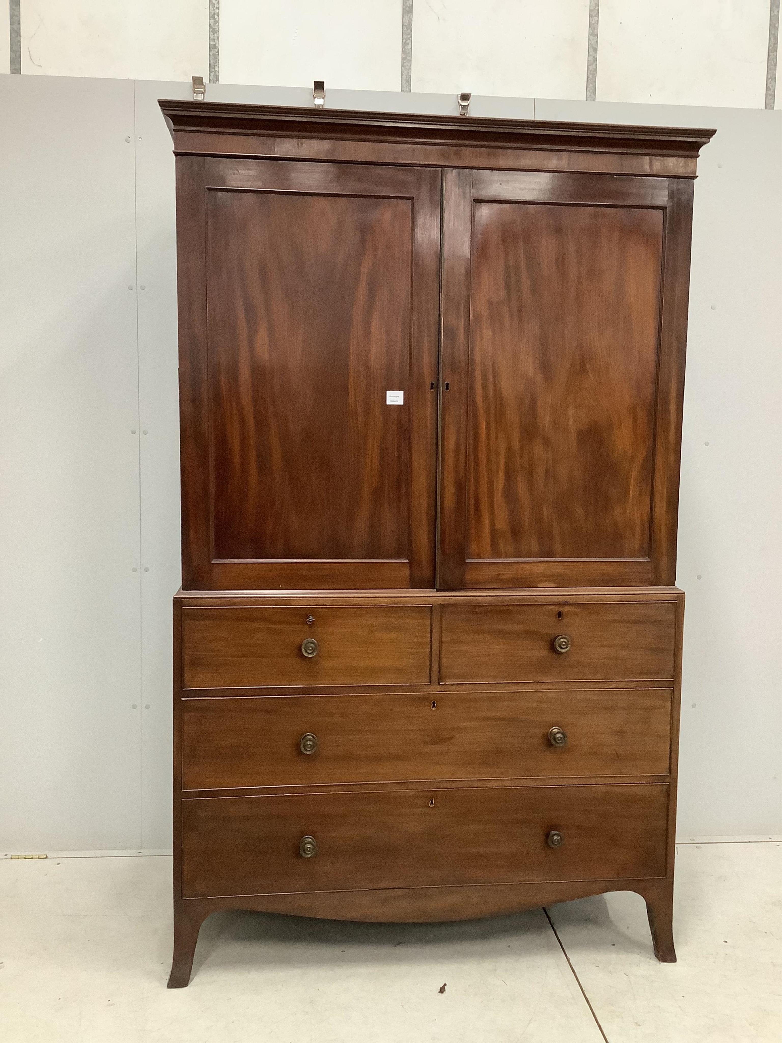 A George IV mahogany linen press, width 128cm, depth 58cm, height 208cm. Condition - fair, interior adapted